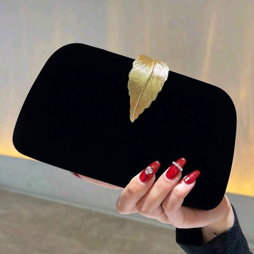 Elegant Black Clutch with Gold Leaf Accent